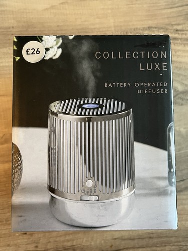 Next silver battery operated - next,